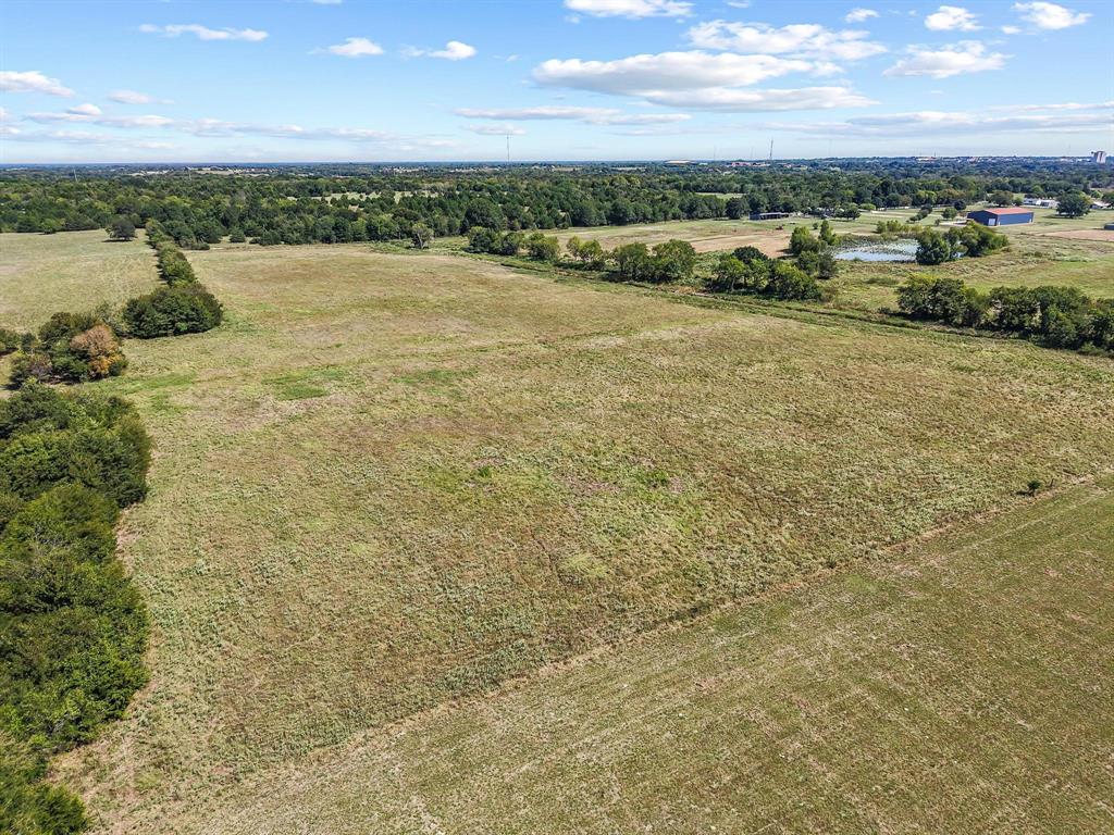 486 Private Road 4402 Commerce, TX 75428 - Photo 3 of 7 a view of a lake with an ocean