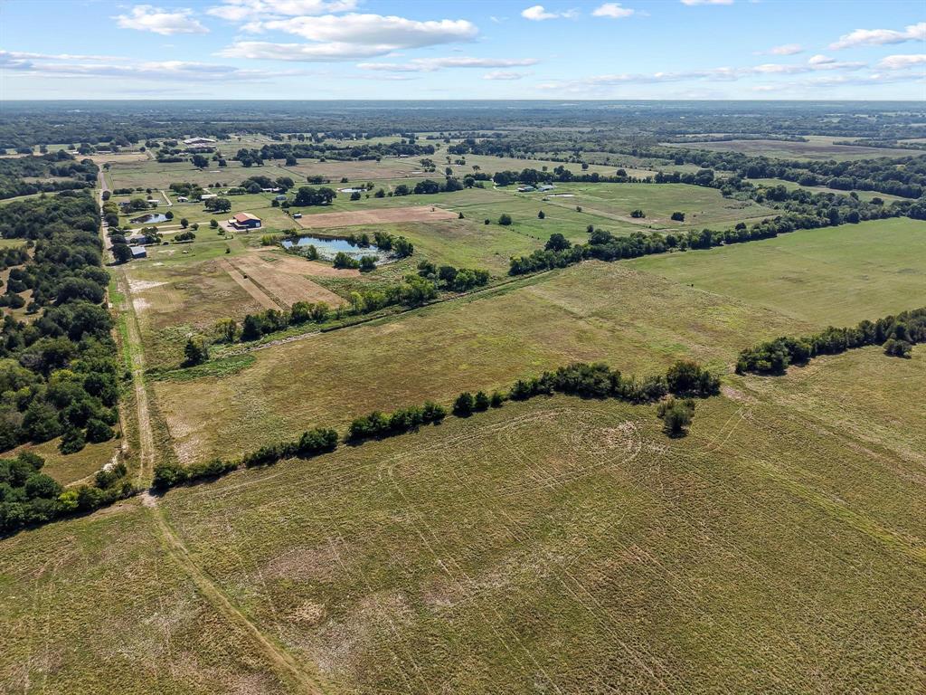 486 Private Road 4402 Commerce, TX 75428 - Photo 6 of 7 a view of a city
