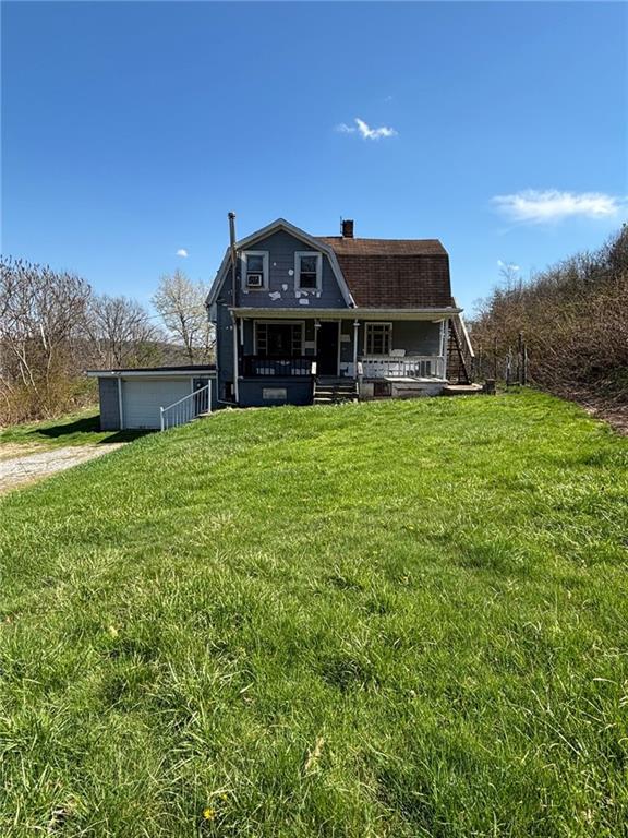 a house view with a garden space