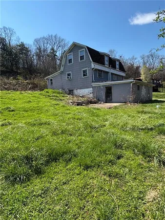 a house view with a garden space