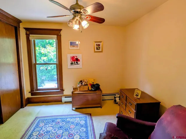 a room with furniture and a window