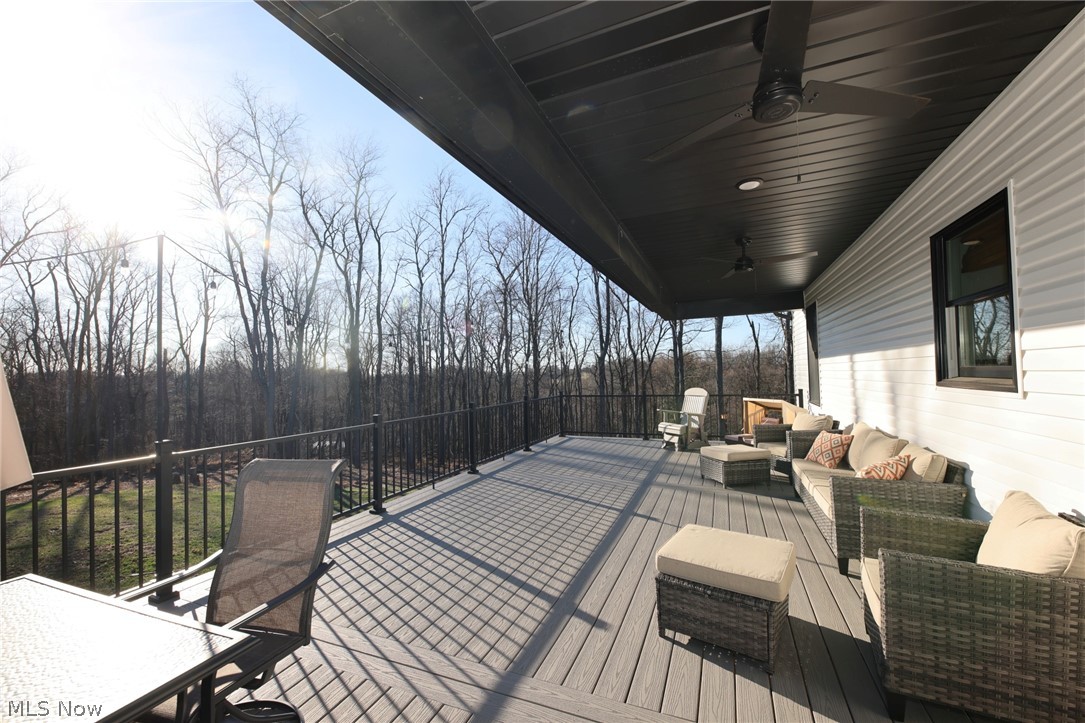 258 Friendly Acres Road Wellsburg, WV 26070 - Photo 31 of 47 Deck with ceiling fan and an outdoor hangout area
