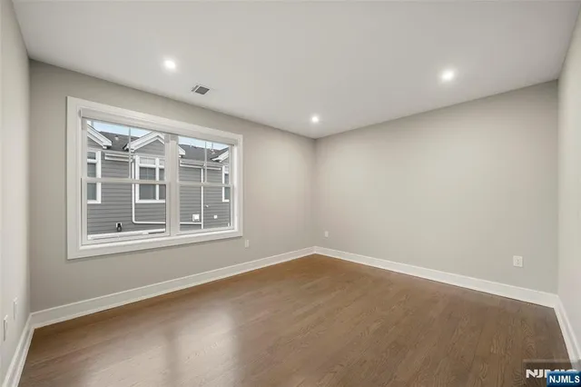 a bathroom with a sink toilet and mirror