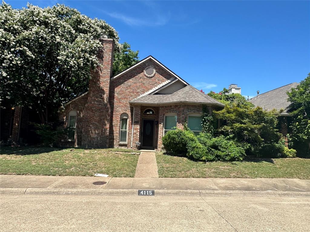 4115 Winding Way Court Dallas, TX 75287 - Photo 1 of 1 a front view of a house with a yard and trees