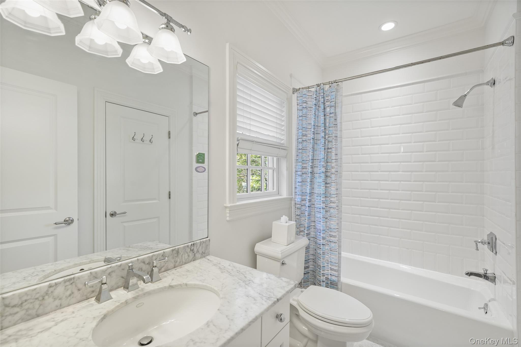 680 Milton Road Rye, NY 10580 - Photo 17 of 32 a bathroom with a sink a toilet and shower