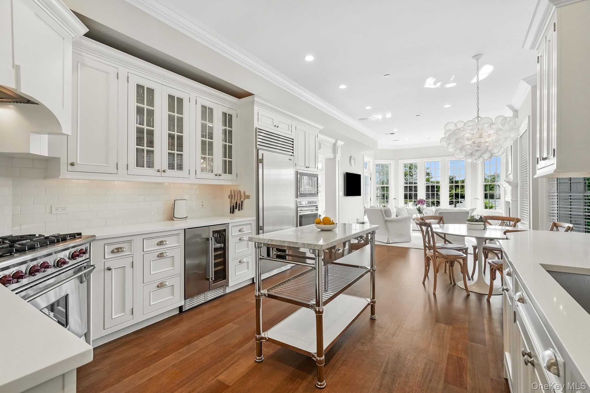 680 Milton Road Rye, NY 10580 - Photo 10 of 32 a open kitchen with stainless steel appliances granite countertop a stove and cabinets wooden floor