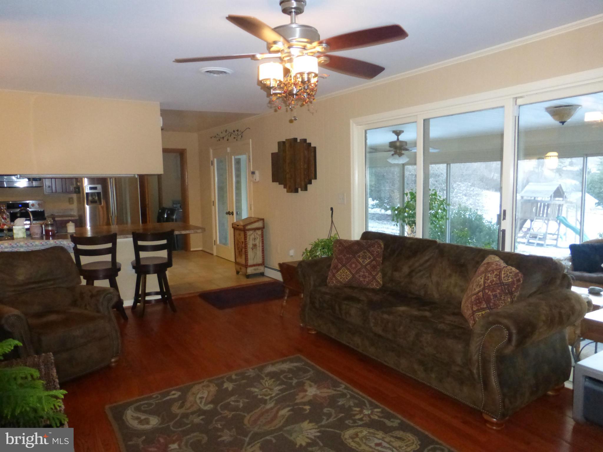5732 Etzler Road Frederick, MD 21702 - Photo 7 of 21 Family Room and Sunroom