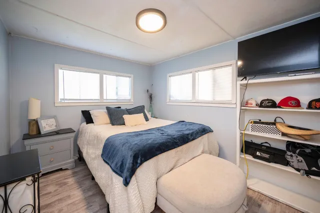 a view of a bedroom from a hallway