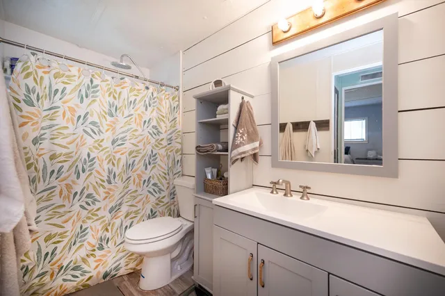 a view of a hallway with washer and dryer