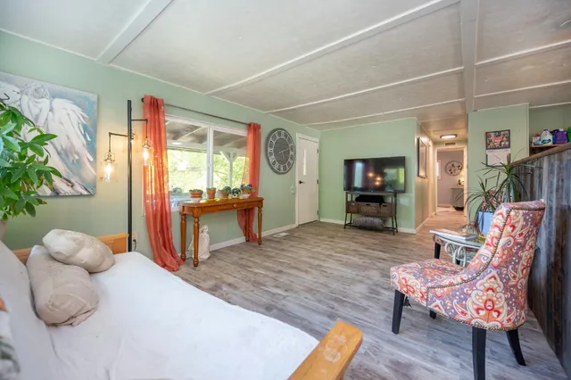 a view of porch with wooden floor in outdoor space