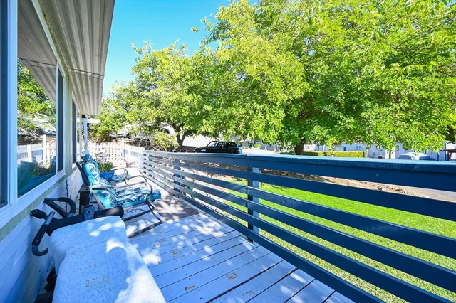 a patio with table and chairs