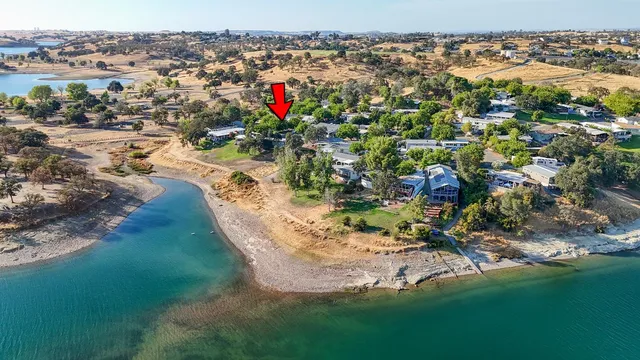 a bedroom with bed and a window