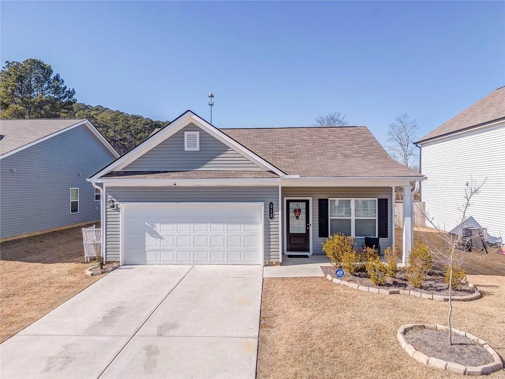 213 Sycamore Drive Calhoun, GA 30701 - Photo 1 of 44 a front view of a house with entertaining space