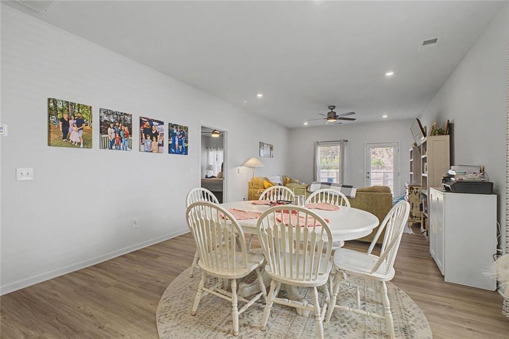 213 Sycamore Drive Calhoun, GA 30701 - Photo 15 of 44 a view of a dining room with furniture