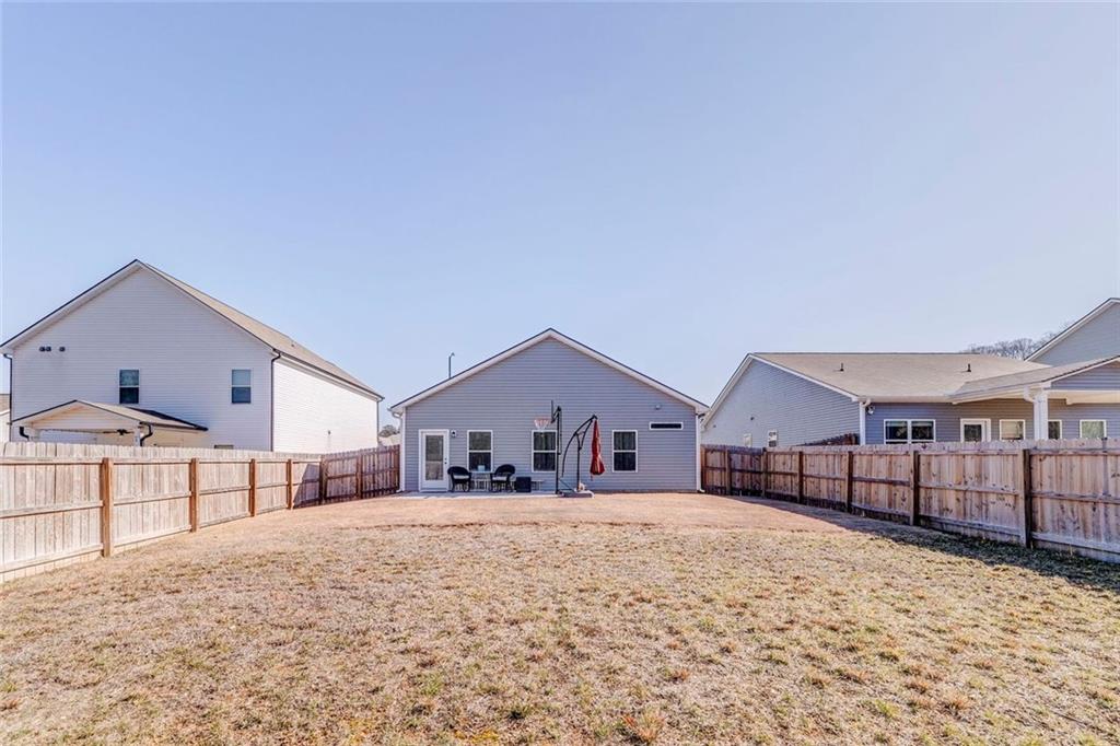 213 Sycamore Drive Calhoun, GA 30701 - Photo 37 of 44 a view of house with a outdoor space