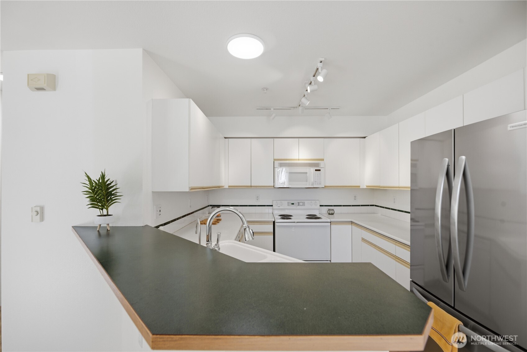 11130 Southeast 208th Street, Unit H102 Kent, WA 98031 - Photo 8 of 38