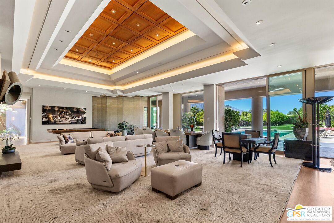 4 Big Sioux Road Rancho Mirage, CA 92270 - Photo 15 of 75 a living room with furniture and a large window
