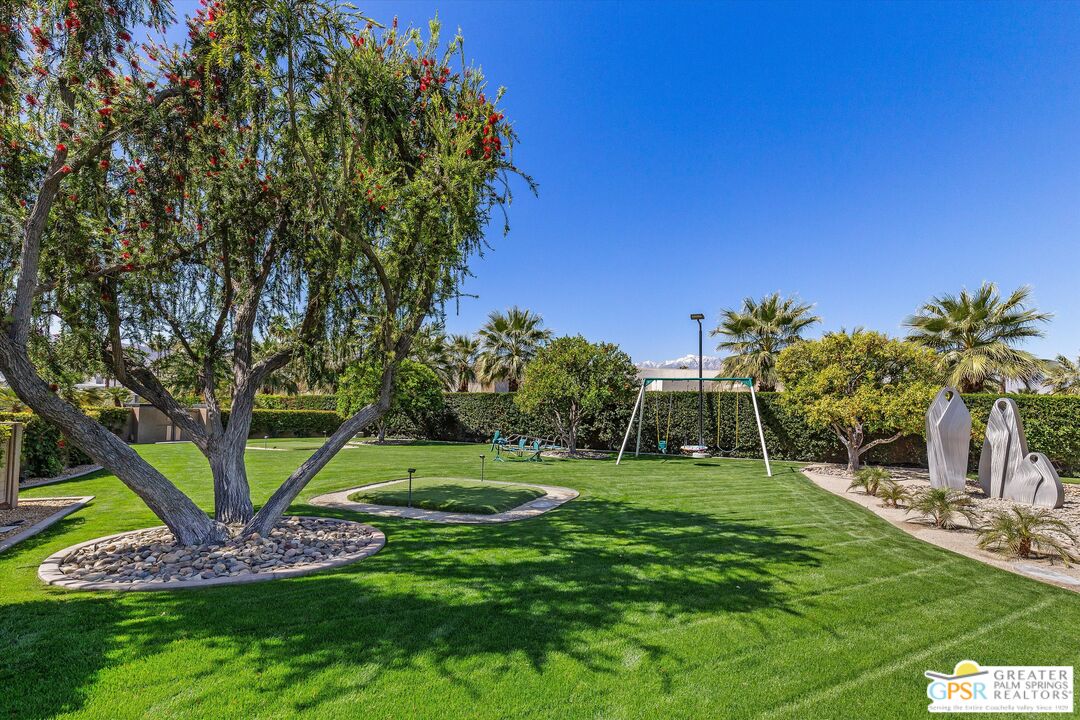 4 Big Sioux Road Rancho Mirage, CA 92270 - Photo 32 of 75 a view of a backyard with a garden