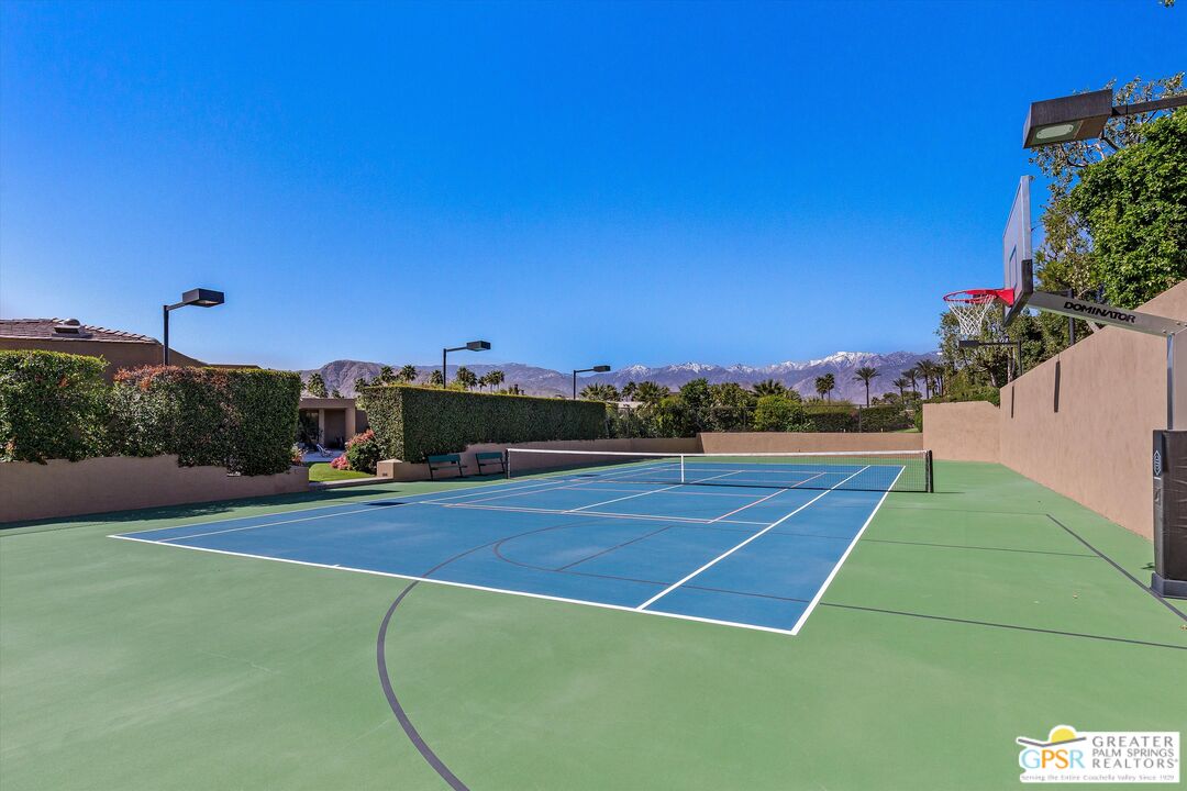 4 Big Sioux Road Rancho Mirage, CA 92270 - Photo 35 of 75 a view of an outdoor space and tennis court