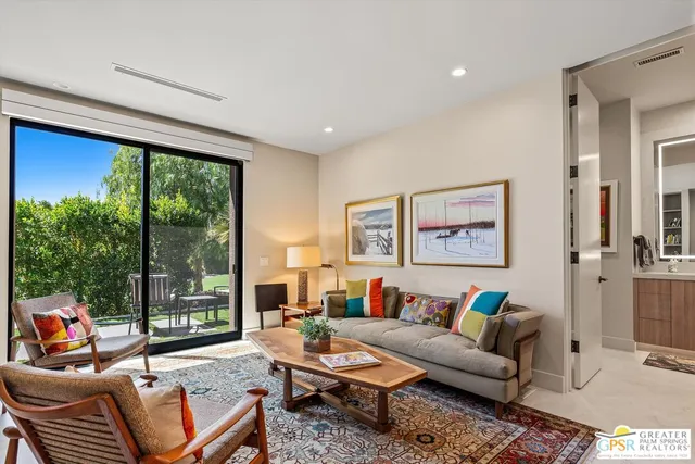 a view of a porch and garden