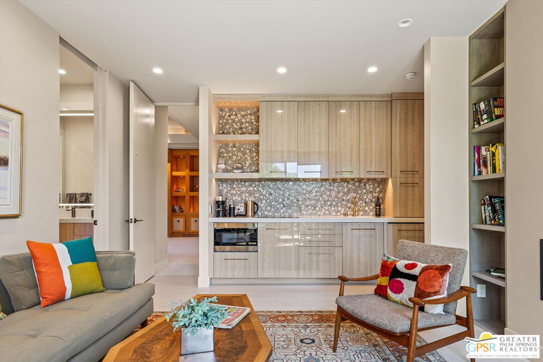 4 Big Sioux Road Rancho Mirage, CA 92270 - Photo 46 of 75 a living room with furniture and a rug