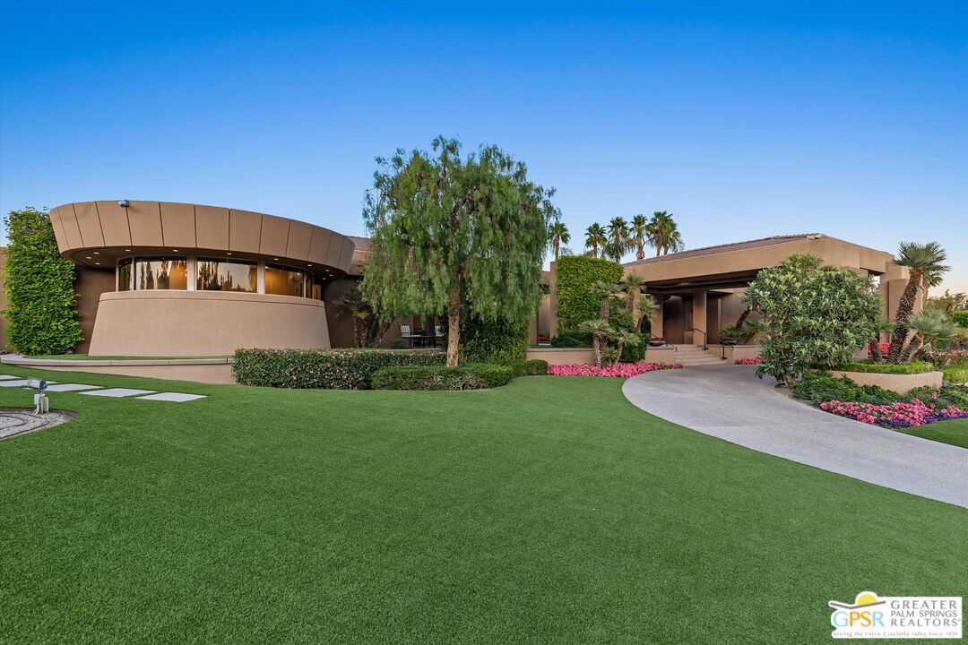 4 Big Sioux Road Rancho Mirage, CA 92270 - Photo 60 of 75 a front view of a house with a yard