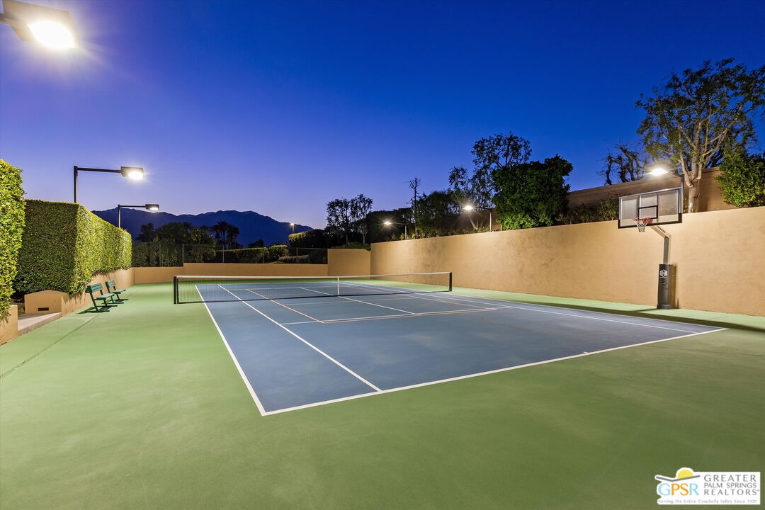 4 Big Sioux Road Rancho Mirage, CA 92270 - Photo 67 of 75 a view of an outdoor space and tennis court