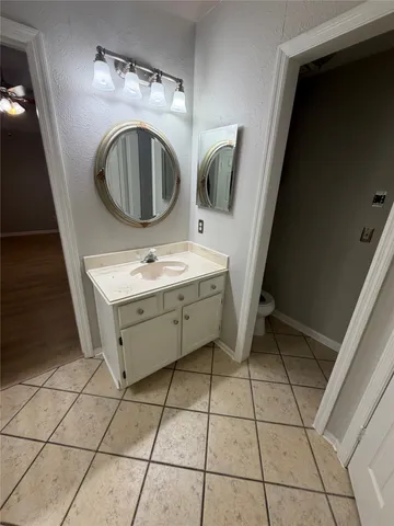 a utility room with a sink a washer and dryer