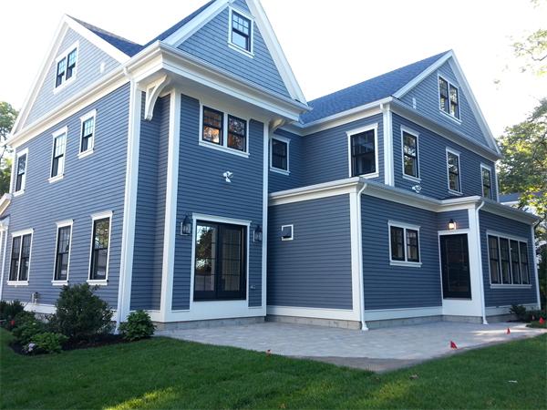 Lot 116 The Ridge Newton, MA 02459 - Photo 2 of 9 a front view of a house with garden