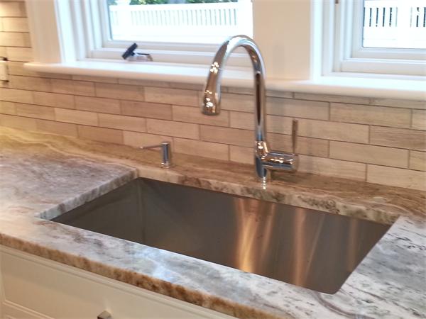 Lot 116 The Ridge Newton, MA 02459 - Photo 7 of 9 a close view of sink and mirror