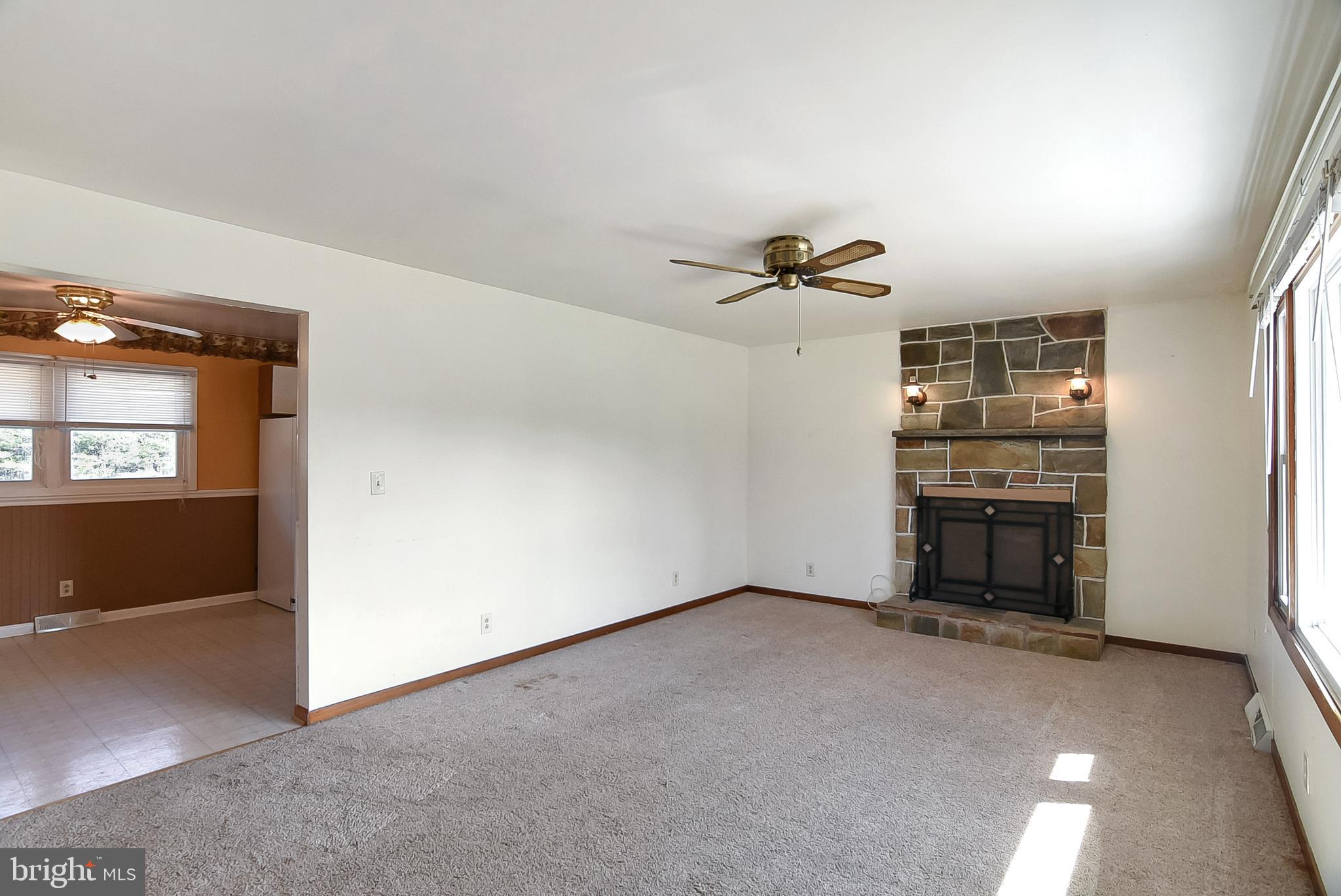 660 Truslow Road Fredericksburg, VA 22406 - Photo 8 of 14 Family Room with a fireplace.