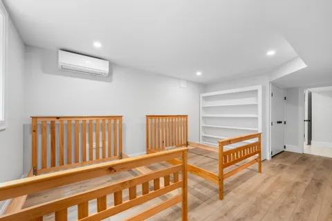 a view of staircase with white walls