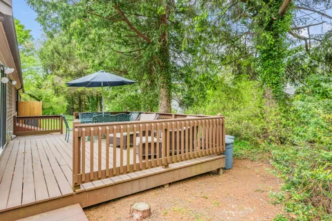 a view of a wooden roof deck