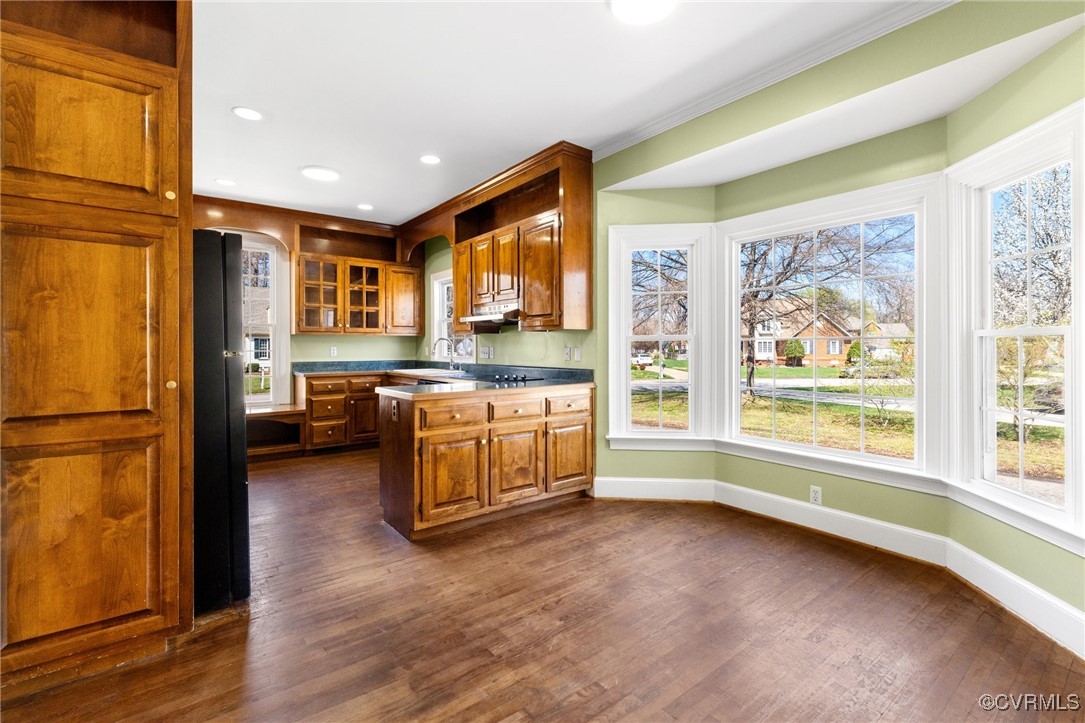 207 Comstock Drive Colonial Heights, VA 23834 - Photo 17 of 44 a kitchen with a refrigerator a stove top oven and a large window