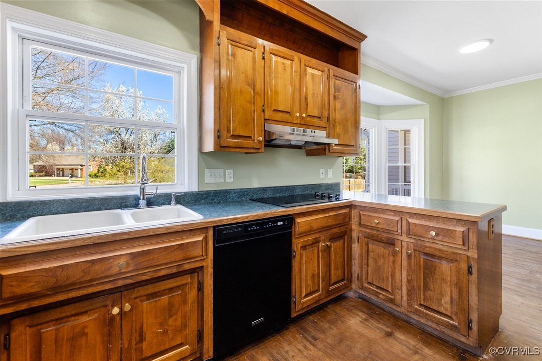 207 Comstock Drive Colonial Heights, VA 23834 - Photo 19 of 44 a kitchen with stainless steel appliances granite countertop a sink and cabinets