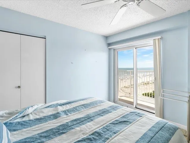 a view of balcony with furniture