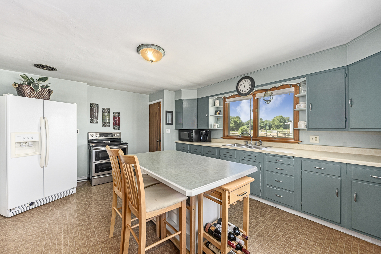 8N680 Percy Road Maple Park, IL 60151 - Photo 12 of 30 a dining room with a table and chairs