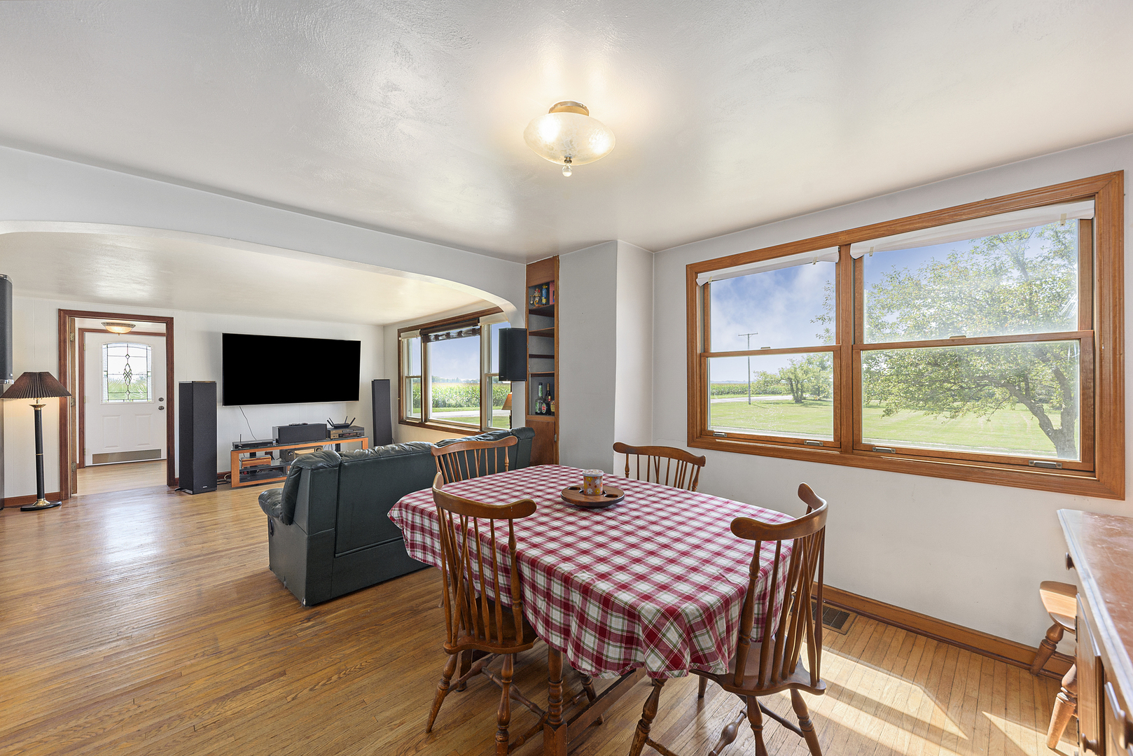 8N680 Percy Road Maple Park, IL 60151 - Photo 9 of 30 a view of a dining room with furniture window and wooden floor