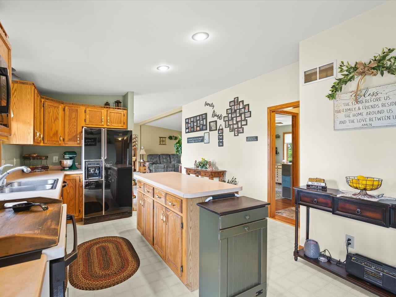 8500 Manchester Road Capron, IL 61012 - Photo 21 of 51 a kitchen with a sink stove and refrigerator