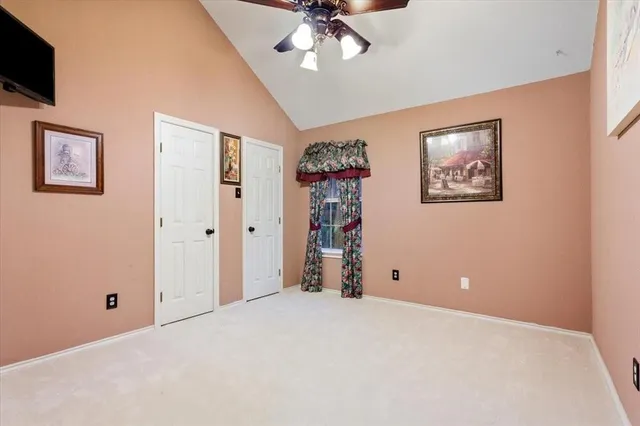 a bathroom with a sink a toilet a shower and a mirror