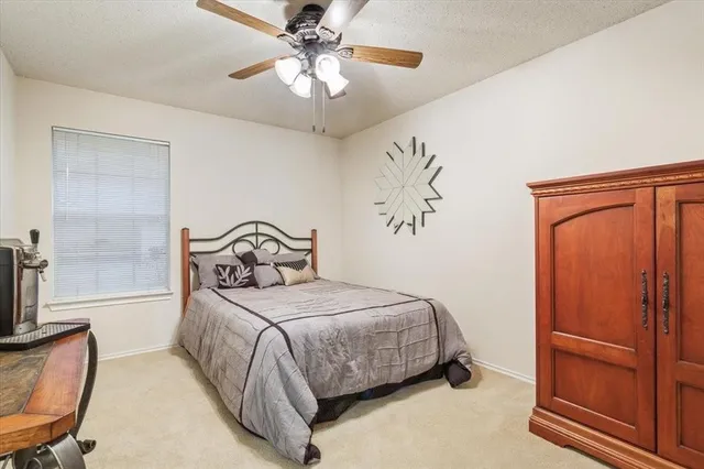 a spacious bathroom with a double vanity sink mirror and a bathtub