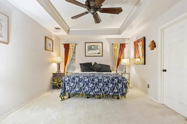 a dining room with a window and furniture