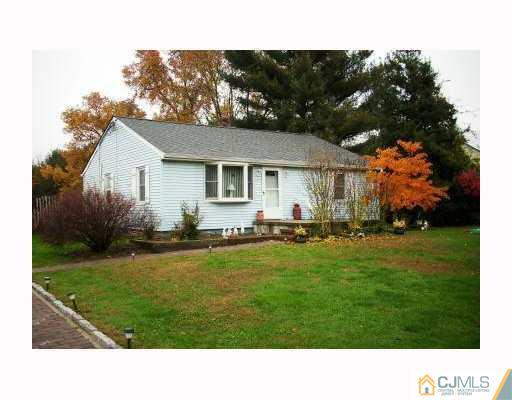 0 Freehold Road Manalapan, NJ 07726 - Photo 1 of 10 a black and white photo of a house