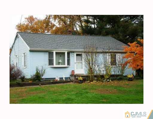 0 Freehold Road Manalapan, NJ 07726 - Photo 2 of 10 a black and white photo of a house