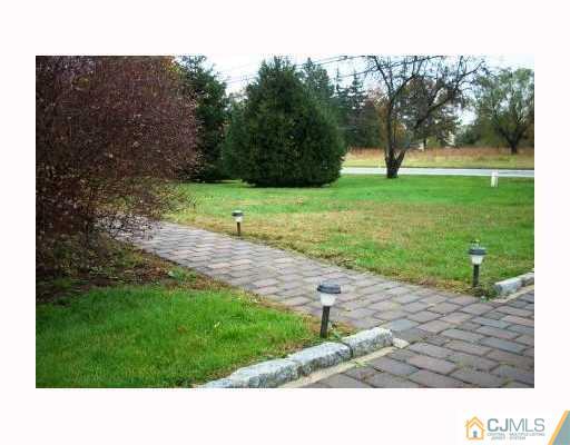 0 Freehold Road Manalapan, NJ 07726 - Photo 6 of 10 a black and white photo of a house