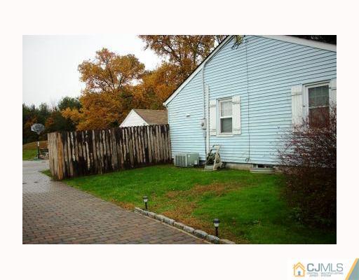 0 Freehold Road Manalapan, NJ 07726 - Photo 10 of 10 a black and white photo of a house