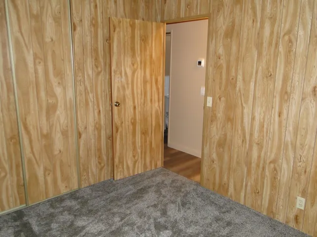 a bathroom with a sink a toilet and a shower