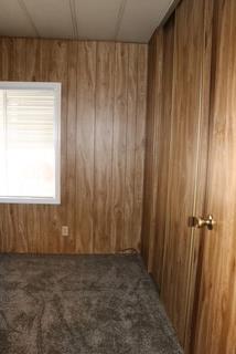 15820 South Harlan Road, Unit 143 Lathrop, CA 95330 - Photo 26 of 40 a view of wooden door