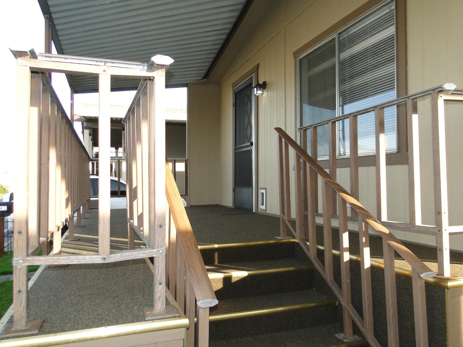 15820 South Harlan Road, Unit 143 Lathrop, CA 95330 - Photo 4 of 40 a view of staircase with railing and white walls