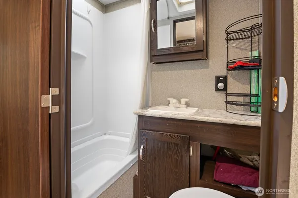 a view of a balcony and chairs